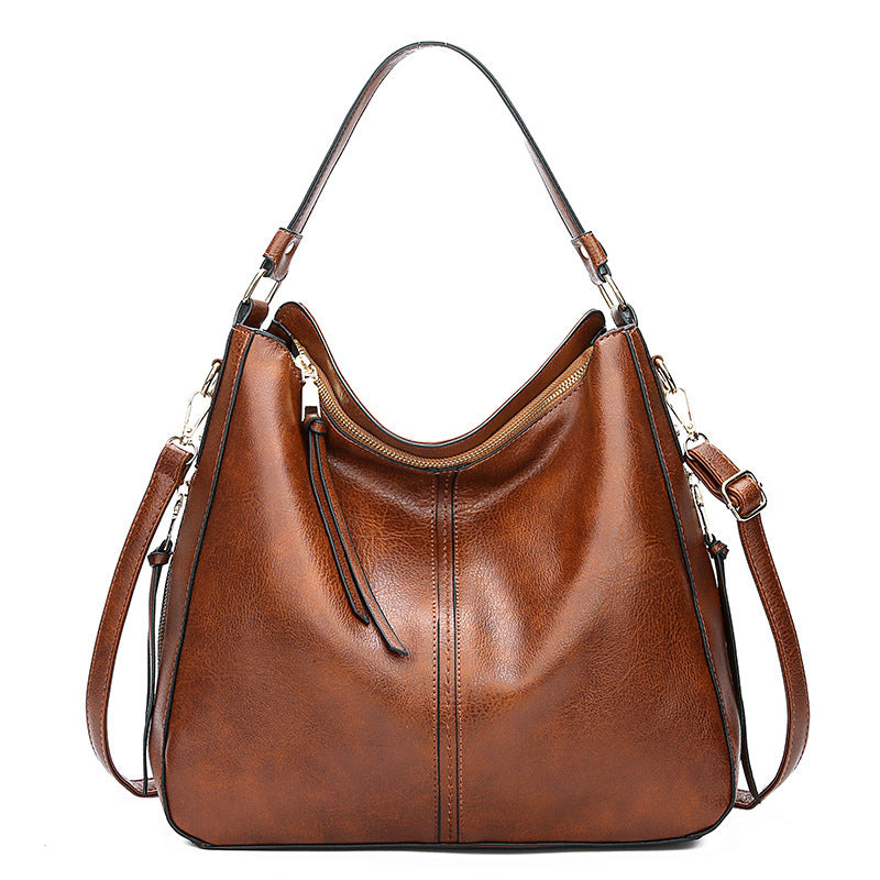 Ersilia™ - Elegant leather bag with large capacity