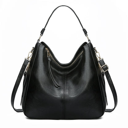 Ersilia™ - Elegant leather bag with large capacity