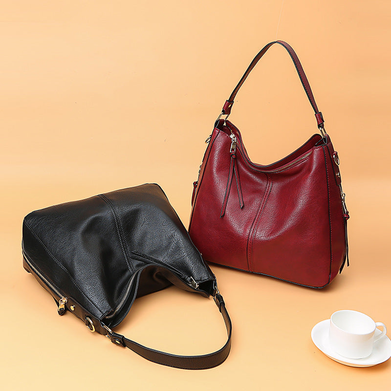 Ersilia™ - Elegant leather bag with large capacity